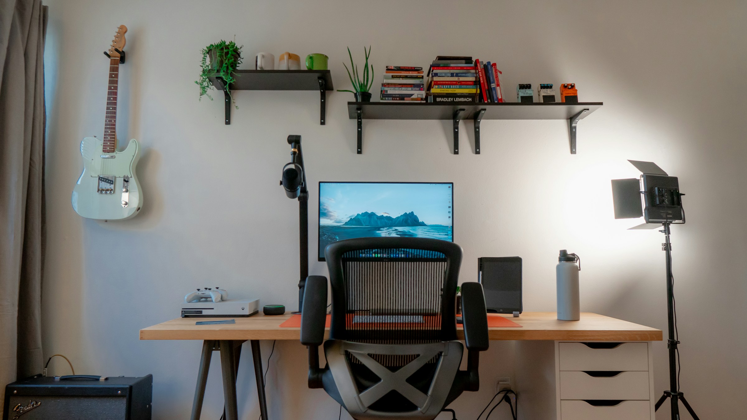 College dorm with laptop and desk
