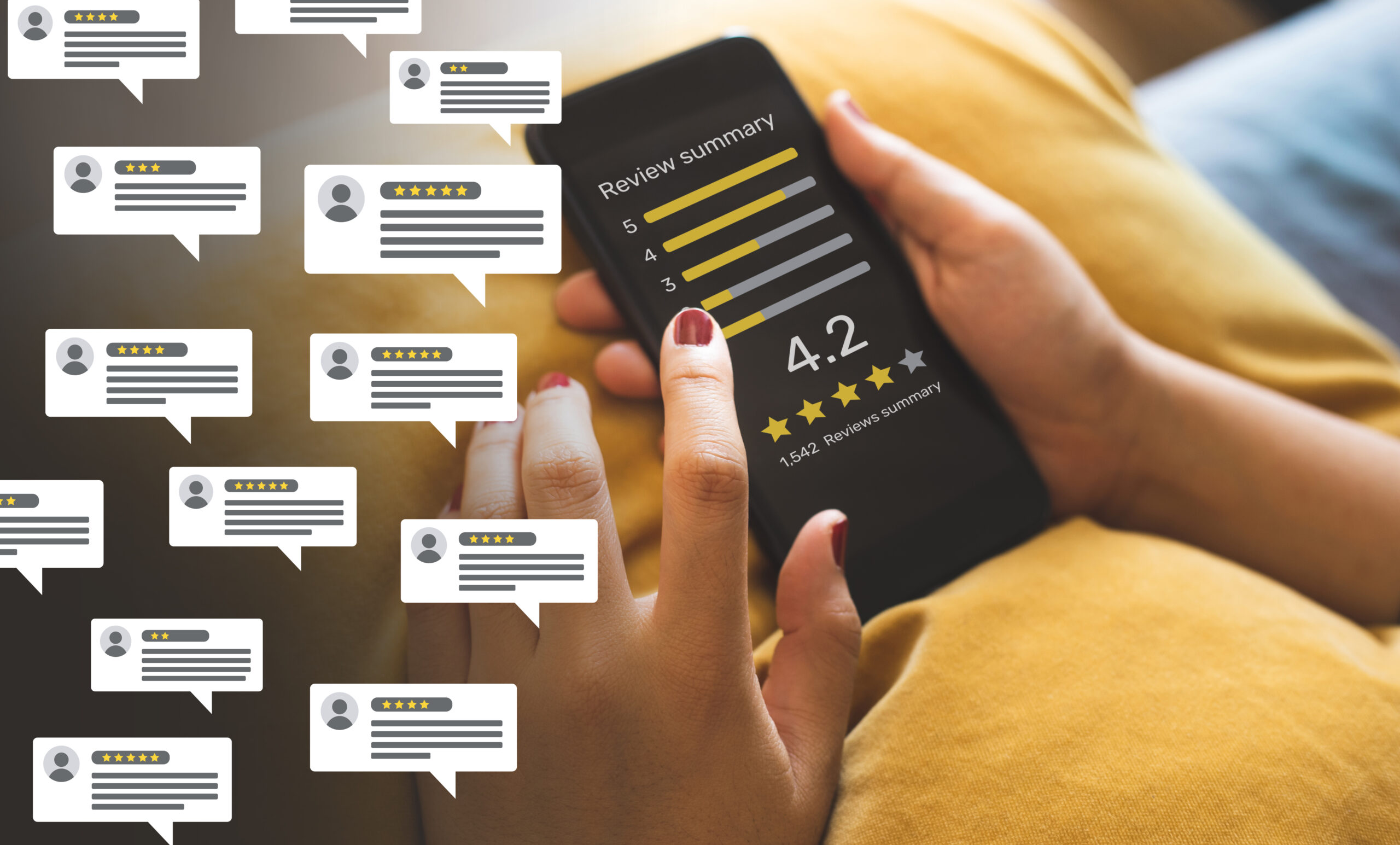 Cell phone showing summary of product reviews with word bubbles.