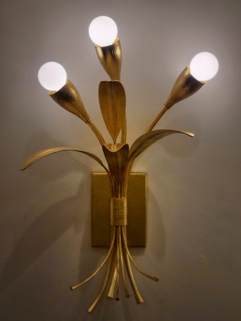 Gold, botanical inspired light fixture