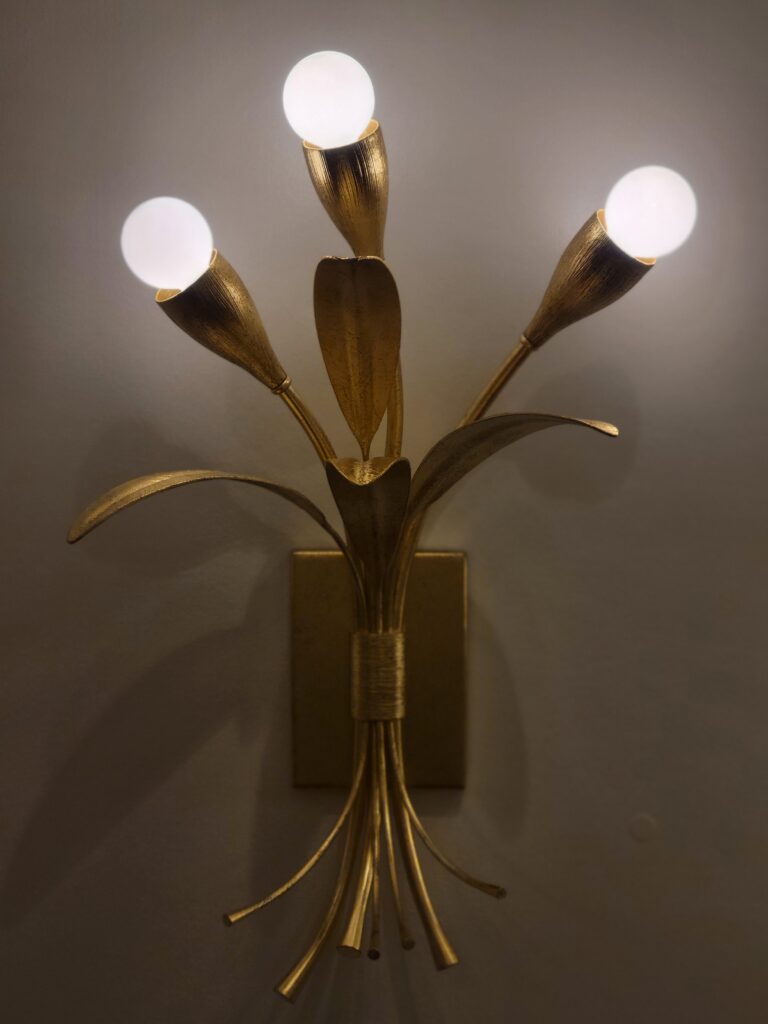 Gold, botanical inspired light fixture