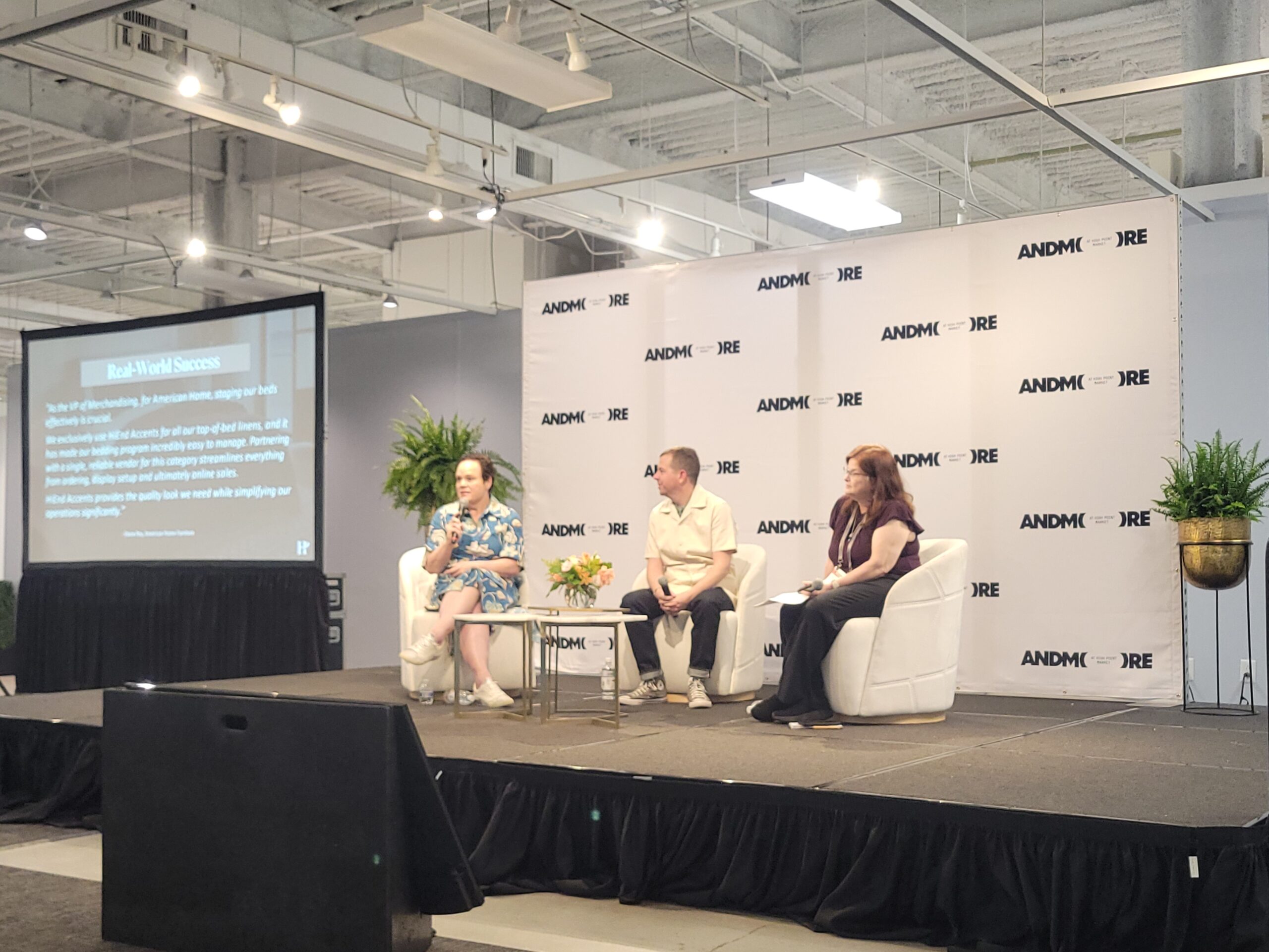 Panel of three people on a stage at High Point Market