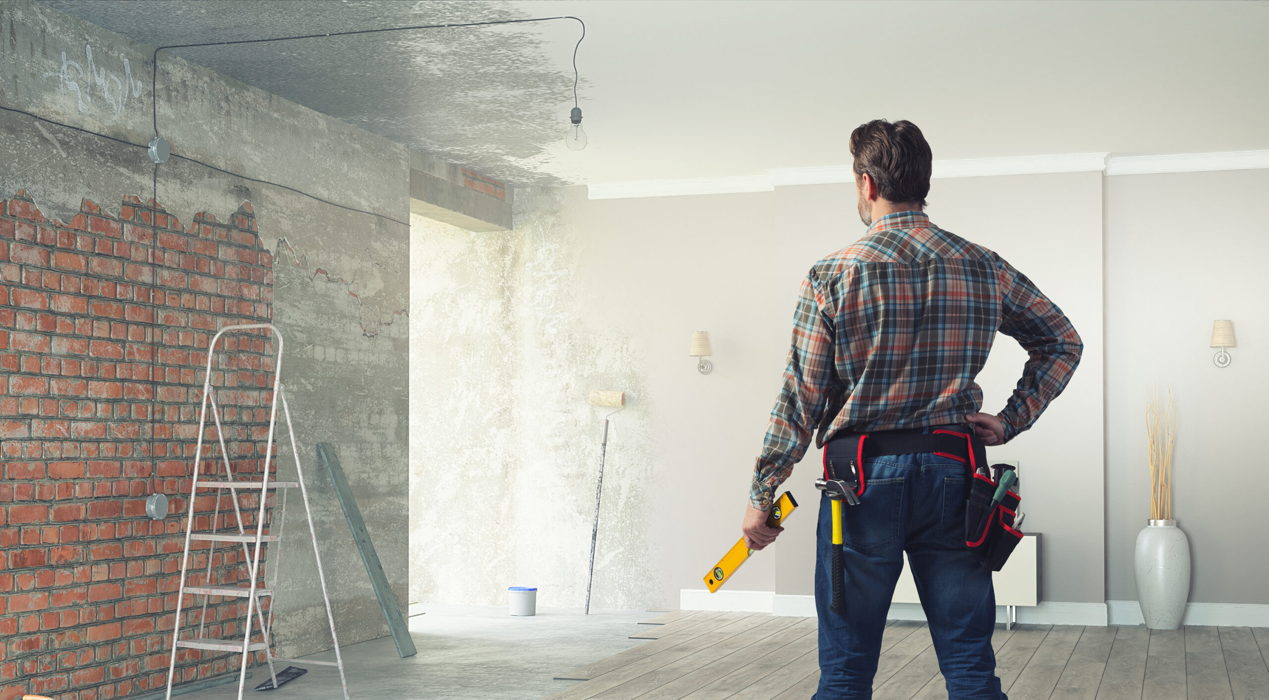 Man standing in home that is being remodeled