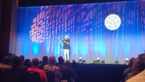 Jesse Itzler speaking on a stage
