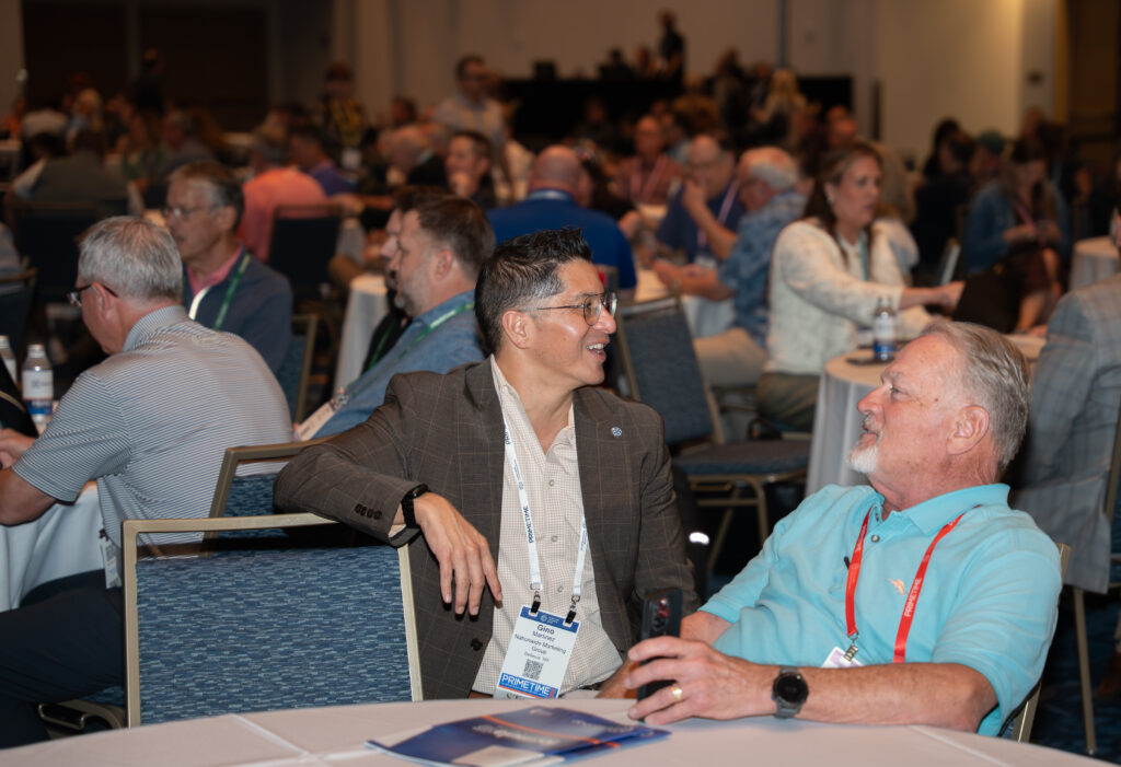 People talking at a conference